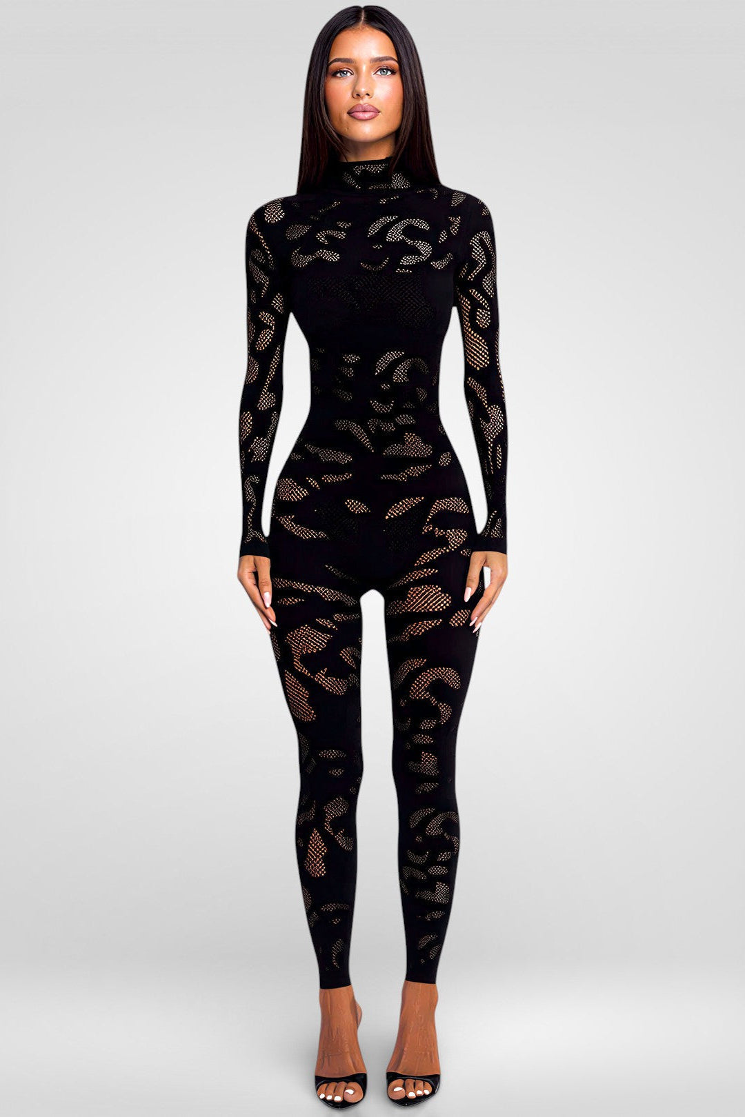 Mystique_zwarte_transparante_bodystocking_met_lange_mouwen_opengewerkte_details_en_nauwsluitende_pasvorm_missq