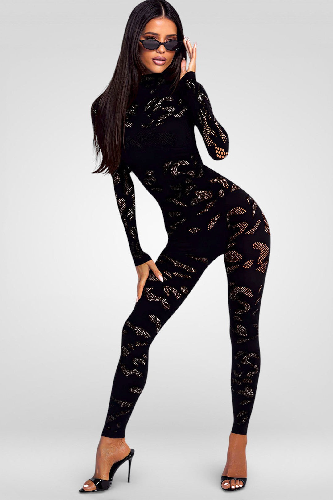 Mystique_zwarte_transparante_bodystocking_met_lange_mouwen_opengewerkte_details_en_nauwsluitende_pasvorm_missq__lingerie