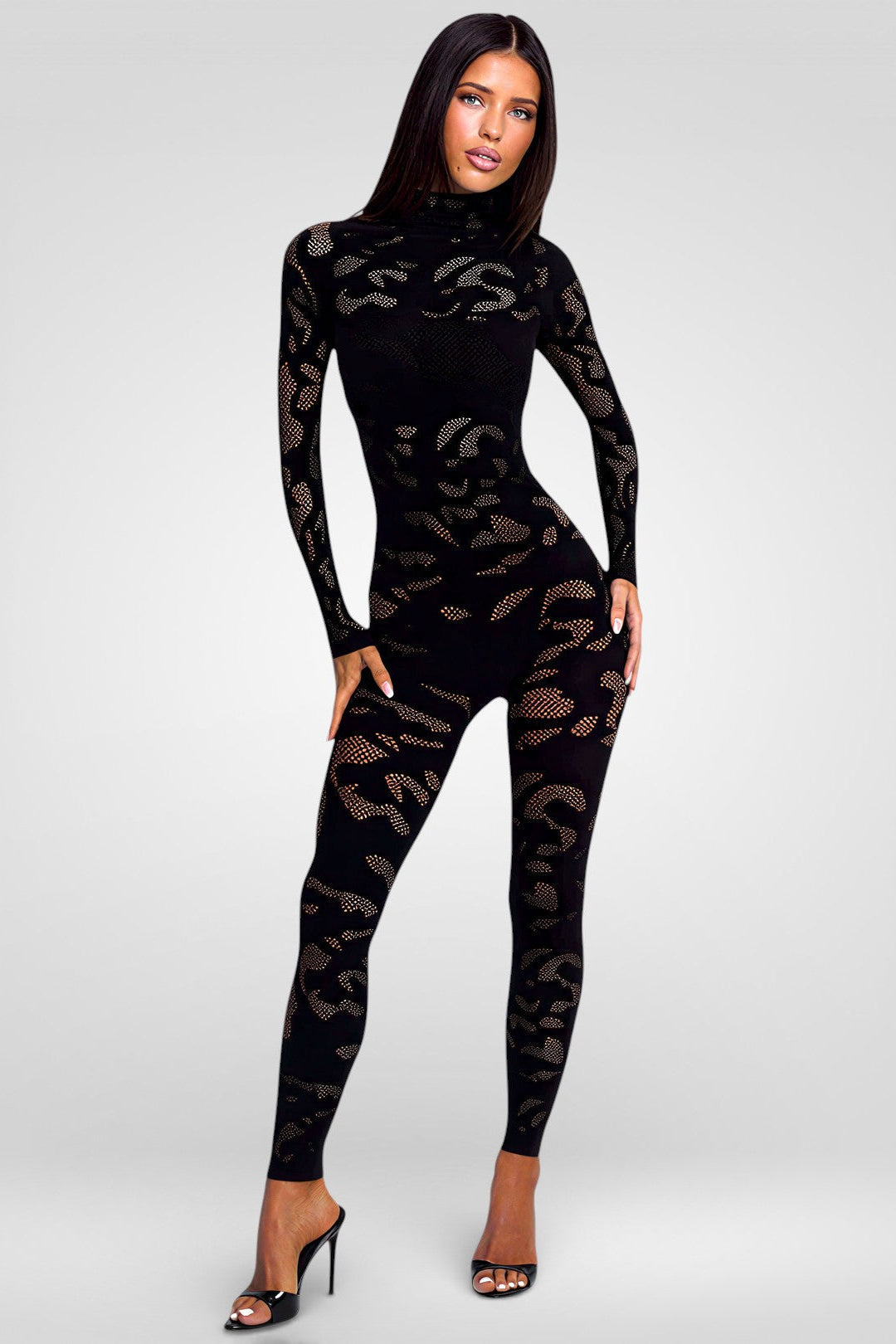 Mystique_zwarte_transparante_bodystocking_met_lange_mouwen_opengewerkte_details_en_nauwsluitende_pasvorm_missqlingerie